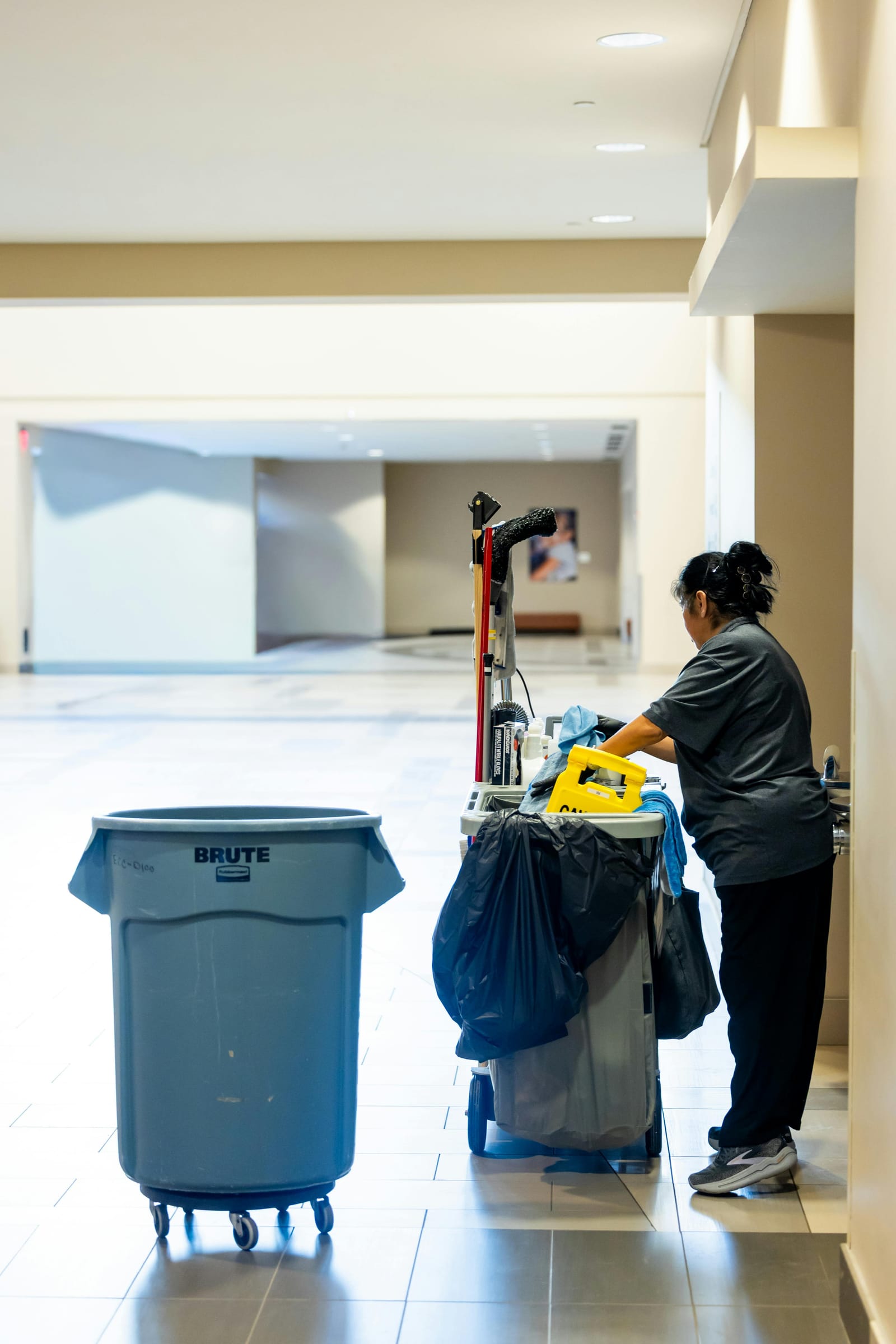 Cleaning crew working inside a commercial office space